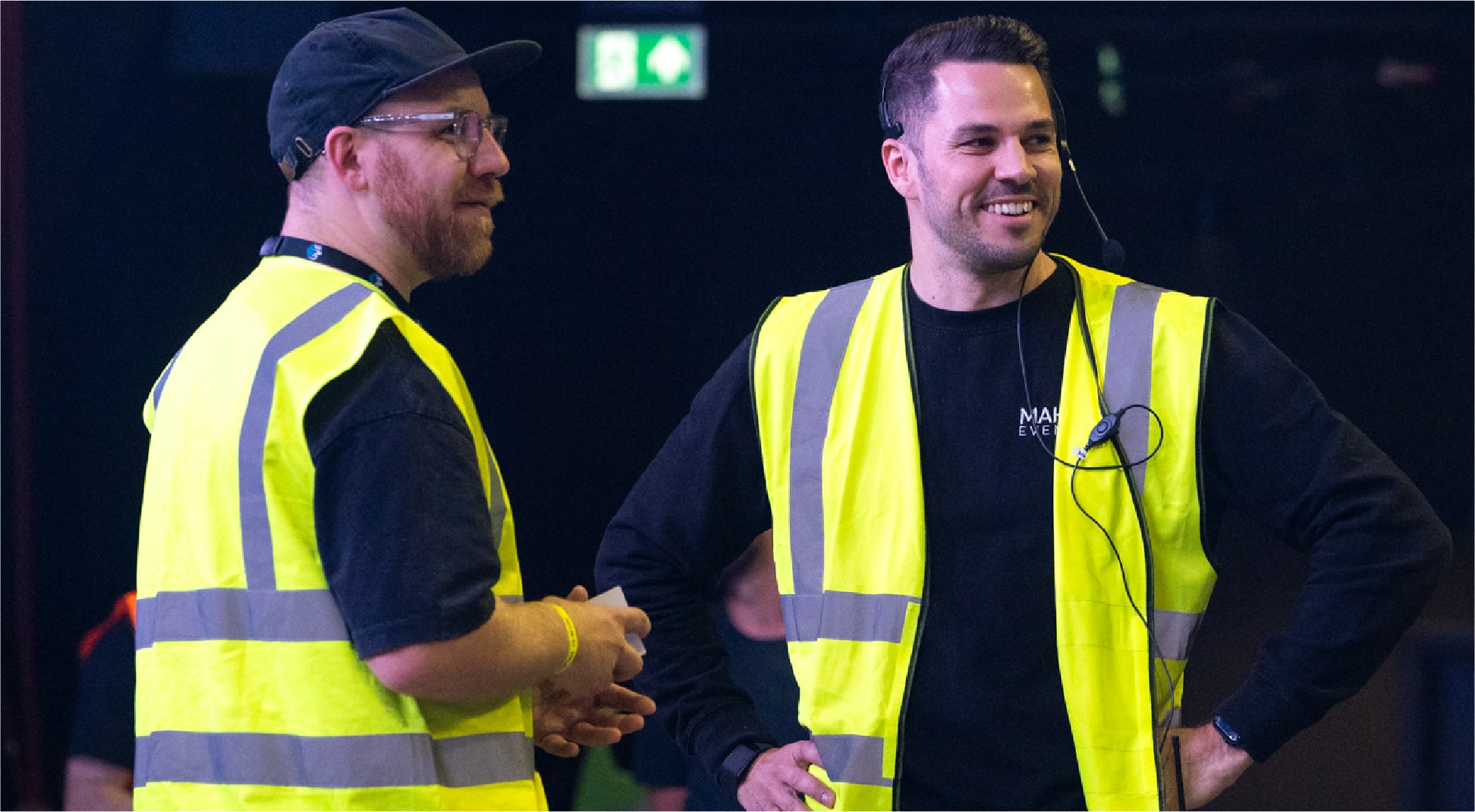 2 men in high vis's talking