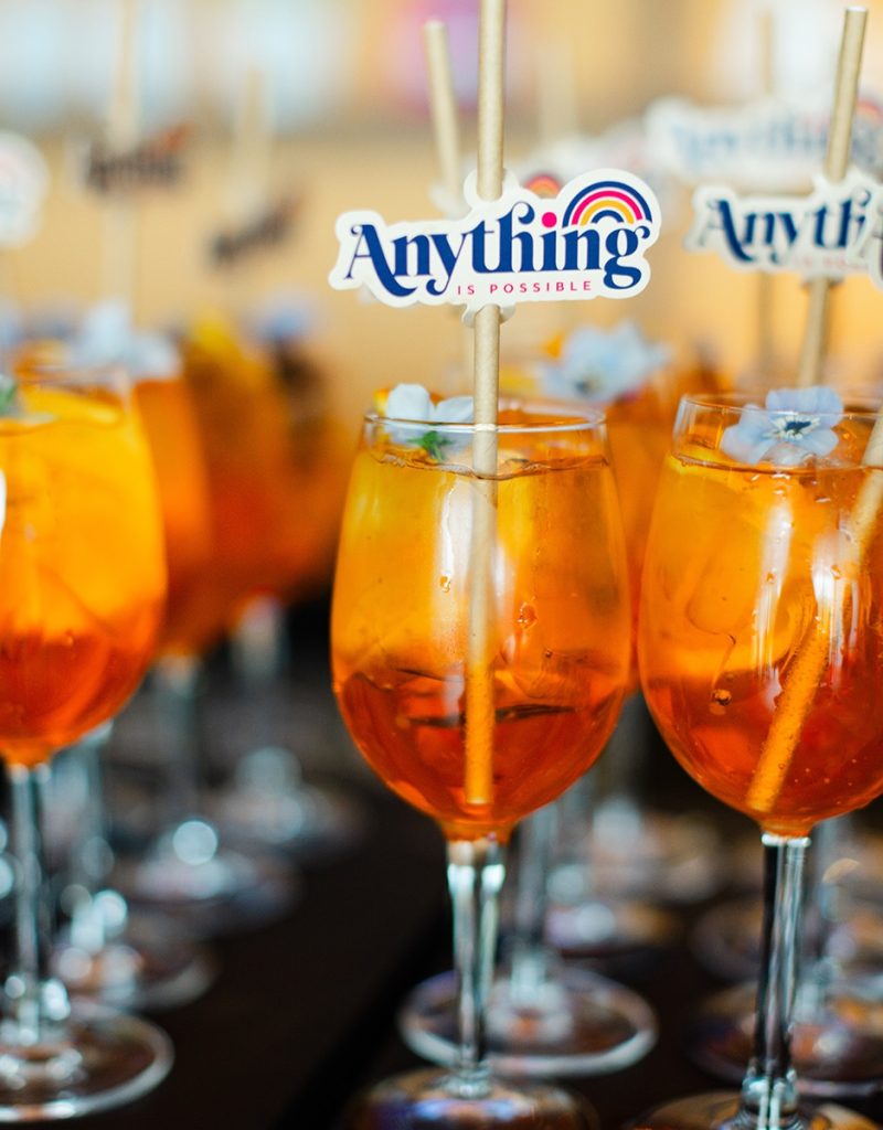 Aperol Spritz with a 'Anything is possible' Straw